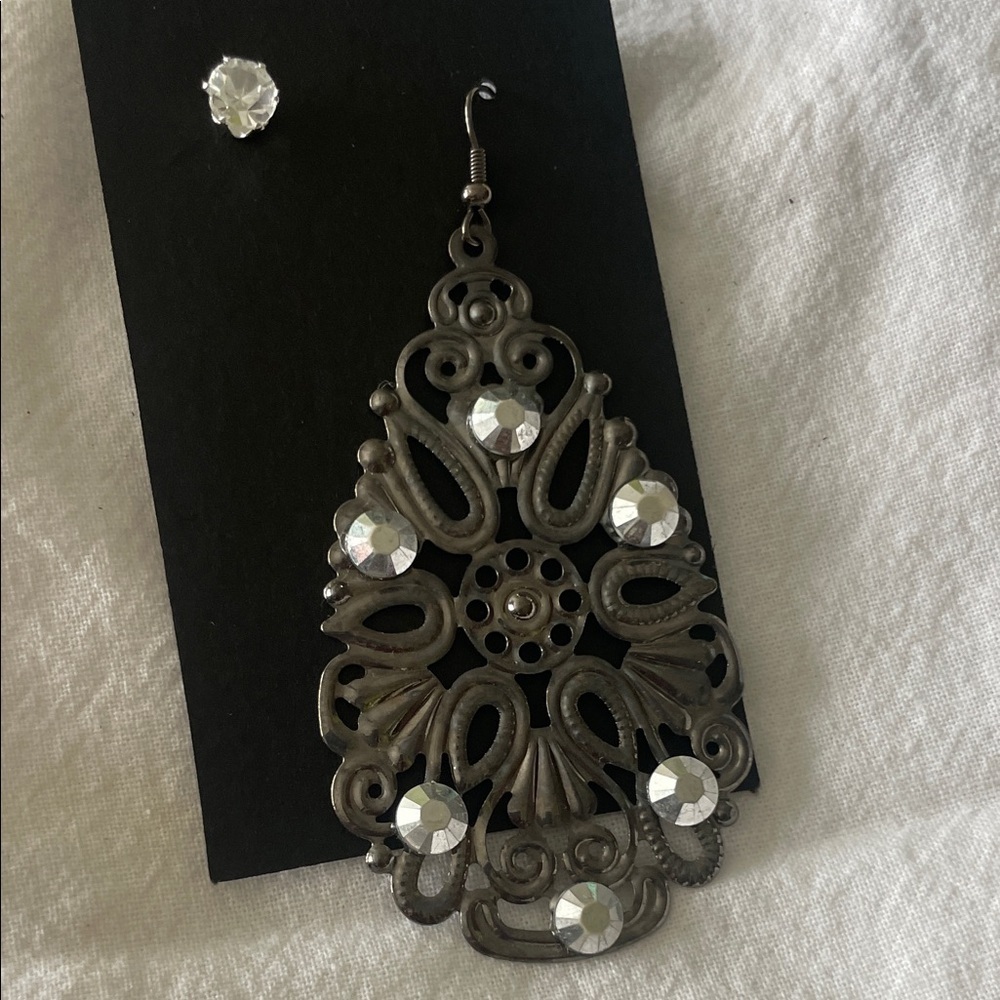 Elegant Silver Drop Earrings with Crystal Accents be different .